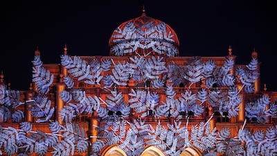 Fern patterns across the Sharjah City Municipality building during the Sharjah Light Festival's opening night. Reem Mohammed / The National