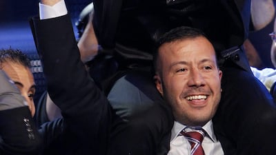 Palestinian contestant Mohammed Assaf (top) cries of joy as he celebrates. AFP Photo/Anwar Amro