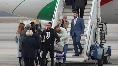 Mr Veselinov and Mr Chanev hug loved ones at Sofia airport. Photo: Office of Elena Yoncheva