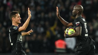 Danilo Pereira celebrates with Ander Herrera. AFP