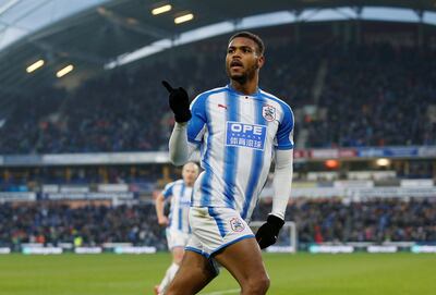 Huddersfield Town’s Steve Mounie celebrates scoring his second goal against Brighton. Ed Sykes / Reuters