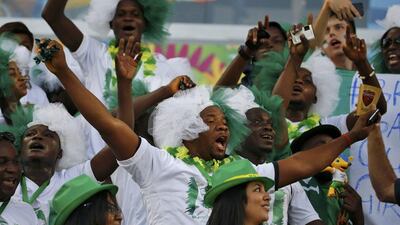 Nigeria fans cheer on the Super Eagles before their match against Bosnia on Saturday night at the 2014 World Cup in Cuiaba, Brazil. Eric Gaillard / Reuters / June 21, 2014