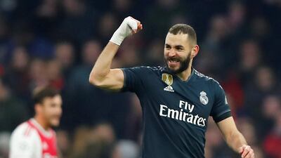 Real Madrid's Karim Benzema celebrates scoring their first goal. Reuters