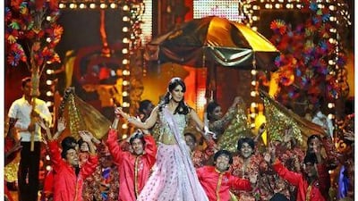 Priyanka Chopra performs a tribute to the legendary singer Asha Bhosle during last year's IIFA awards at the Rogers Centre in Toronto Jewel Samad / AFP
