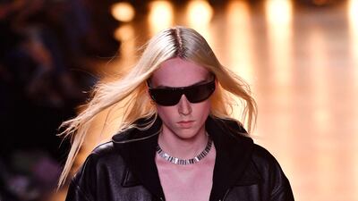 A model in an all-black look. AFP