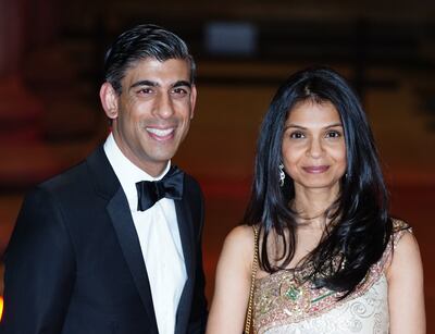 Chancellor of the Exchequer Rishi Sunak with his wife Akshata Murty in February. PA