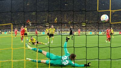 Leroy Sane scores Bayern Munich's second goal against Dortmund. Getty