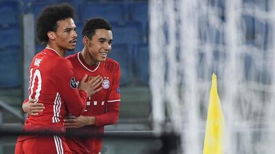 Jamal Musiala (R) with teammate Leroy Sane (L) after his goal. EPA
