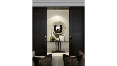 Bradley mixes classic pieces such as the Paris three-legged console from her furniture collection with more modern ones such as the Convex mirror. Courtesy of louisebradley.co.uk