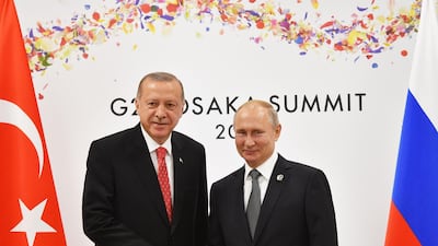 Recep Tayyip Erdogan’s forging a close relationship with Russian President Vladimir Putin raises questions on where Turkey’s allegiance lies. Yuri Kadobnov / AFP