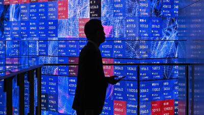 Investors remain worried about an AI bubble bursting, but survivors of the dotcom crash say an overall correction is more likely. AFP