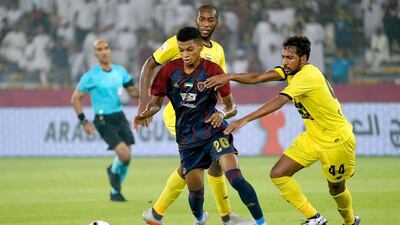 Yahya Al Ghassani, centre, is attracting attention from clubs in Europe, including Premier League side Burnley. Courtesy Al Wahda