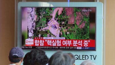People at the Seoul Railway station in South Korea watch a TV news reporting about a possible nuclear test conducted by North Korea on September 3, 2017. Ahn Young-joon / The Associated Press