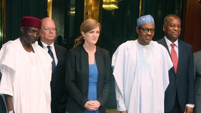 In this file photo taken on April 21, 2016 Nigerian President Mohammadu Buhari poses in a group photograph with Chief of Staff to the President Abba Kyari (L). AFP