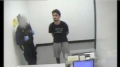 Danyal Hussein, who had Asperger’s syndrome, is seen while in police custody. Reuters