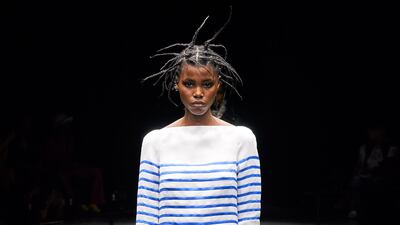 House codes of Breton stripes and tartan reappeared at the Jean Paul Gaultier couture show, pieced from satin ribbon and fragments of utility clothing.