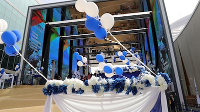 The Israeli pavilion is decorated with blue and white balloons.