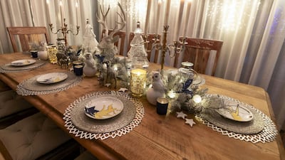 The dining table stars a stag figurine as the centrepiece