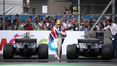 Mercedes' Lewis Hamilton celebrates after winning the World Championship. Edgard Garrido / Reuters