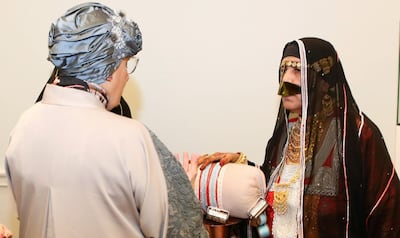 Sheikha Jawaher bint Mohammed Al Qasimi with artisans from Irthi Contemporary Crafts Council.
