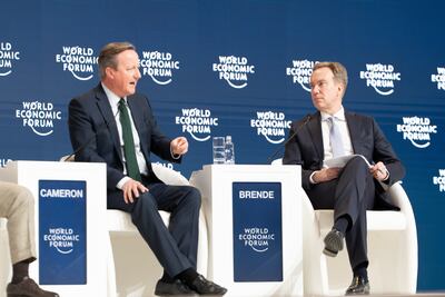 British Foreign Secretary David Cameron and President of the World Economic Forum Borge Brende on stage at the closing plenary in Riyadh. EPA