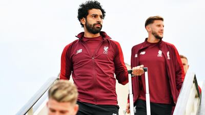 A handout photo made available by the UEFA of Liverpool's manager Juergen Klopp (C-L) receiving a gift as he arrives ahead of the UEFA Champions League final at IEV Airport in Kiev, Ukraine. EPA / UEFA / HANDOUT