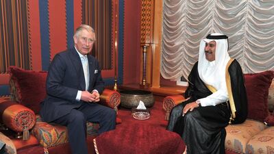 Britain's Prince Charles with Sheikh Hamad bin Jassim Al Thani on an official visit to Doha in March 2013. PA