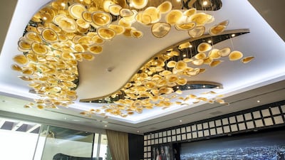 The chandelier inside Adel and Sana Sajan's bedroom was designed with their initials.