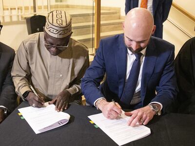 Prof Abba Tijani, left, director general of NCMM, and Michael Salter-Church, chairman of trustees at the Horniman Museum in South London, at a ceremony on Monday to begin returning looted Benin bronzes to Nigeria. PA
