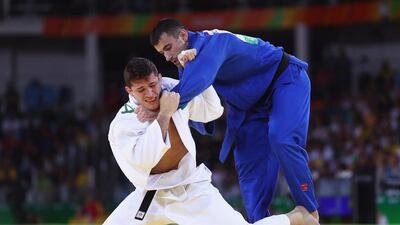 Sergiu Toma of the UAE, in blue, and Victor Penalber of Brazil compete during the men's -81kg bout on Day 4 of the Rio 2016 Olympic Games at the Carioca Arena 2 on August 9, 2016 in Rio de Janeiro, Brazil. Ryan Pierse / Getty Images