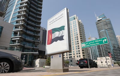 A poster in Dubai Marina that reads 'UAE a nation for humanity'. The relationship between the Emirates and its foreign residents has always been symbiotic. Chris Whiteoak / The National