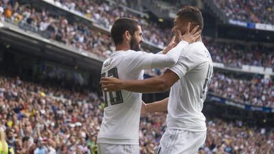 Real Madrid playmaker Isco, left, is a reported target of Manchester City, although interest in the Spain international will be high if Madrid decide to sell. Curto De La Torre / AFP