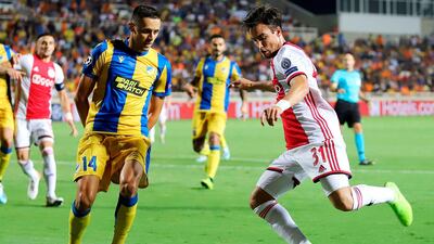 Ajax defender Nicolas Tagliafico attempts a cross into the APOEL box. AFP