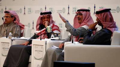 Mohammed Al Jadaan, Saudi minister of finance (2nd left), at a news conference announcing the 2018 state budget, in Riyadh. Faisal Al Nasser/Reuters