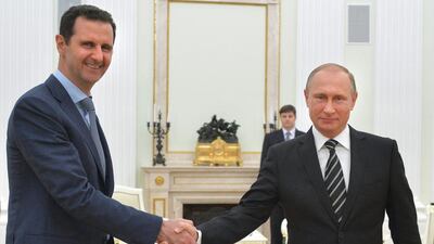 Russian president Vladimir Putin shakes hand with Syria president Bashar Assad in the Kremlin in Moscow, Russia. Alexei Druzhinin / Kremlin Pool Photo via AP