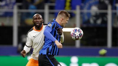 Valencia's Eliaquim Mangala, left, was one of five players and staff at the club to test positive. "I'm feeling good and I have no symptoms associated with the virus. However, I am confined in house and separated from my family," he said on Twitter. AP Photo