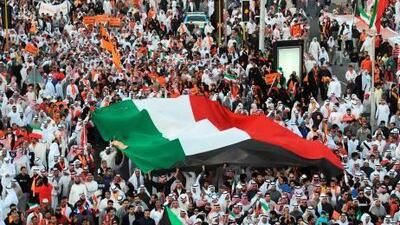 Thousands of Kuwaitis protest the government's amendment of the electoral law in November. Many of the young protesters just want their country - on the most basic level - to work. Gustavo Ferrari / AP Photo