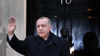 Turkey's President Tayyip Erdogan waves outside 10 Downing Street ahead of the NATO summit in London, Britain December 3, 2019. Daniel Leal-Olivas/Pool via REUTERS