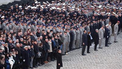 French President Emmanuel Macron attends the national tribute ceremony to the late 13 French soldiers killed when two helicopters collied in Northern Mali, at the Hotel National des Invalides in Paris, France. EPA