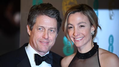 British actor Hugh Grant (L) and Swedish producer Anna Eberstein (R) pose upon arrival at the BAFTA British Academy Film Awards last year. Veteran bachelor Hugh Grant is getting married for the first time at the age of 57 to his Swedish girlfriend, 39-year-old television producer Anna Eberstein. AFP