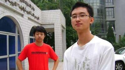 Hang Qichao, right, and Sue Wenbo at the School of Arabic at Beijing Foreign Studies University, where they are studying Arabic.