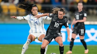 Philippines' Jaclyn Sawicki, left, and New Zealand's Annalie Longo battle for the ball. AP