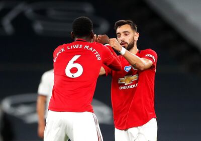 Manchester United's Bruno Fernandes celebrates scoring from the penalty spot. PA