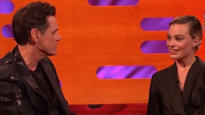 Margot Robbie grimaced through Jim Carrey's awkward comments. YouTube