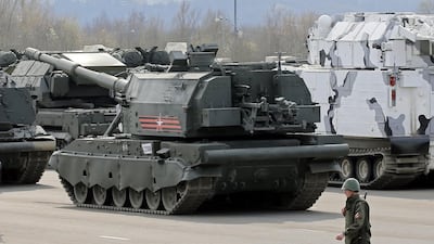A soldier patrolling near military equipment in Moscow, Russia, on April 21, 2018. Yuri Kochestkov / EPA