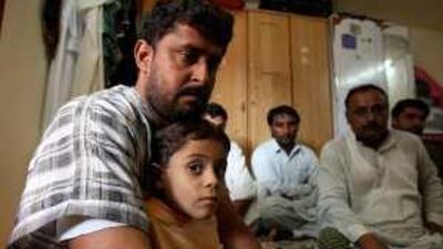 Mukhtiar Ahmed. pictured with his son Mustaffa, asked for the death penalty for the man accused of killing his other son, Moosa