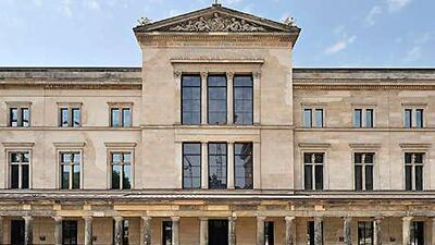 The east facade of the neoclassical Neues Museum on Museum Island, Berlin. Built in the mid-19th century and restored after seven decades, the museum is now a must-visit attraction.