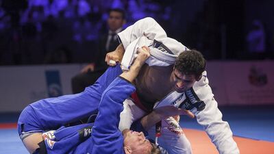 Leandro Nascimento of Brazil grapples with Keenan Cornelius of the US during the open weight black third place match on Saturday at the Abu Dhabi World Professional Jiu-Jitsu Championship, which Nascimento won. Mona Al Marzooqi / The National