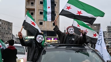 Residents take to the streets to celebrate the takeover by the Syrian army of the city of Raqqa by government forces pushing into the north and east against Kurdish forces. Getty Images