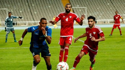UAE, in red, have had a positive build-up to their Asian Cup campaign so far, including a draw against Honduras. AFP